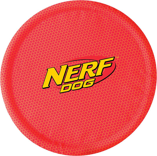 Side angle view of Nerf Dog red nylon frisbee for dogs