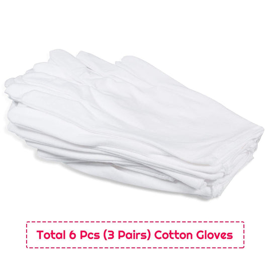 Person wearing white cotton gloves for moisturizing hands