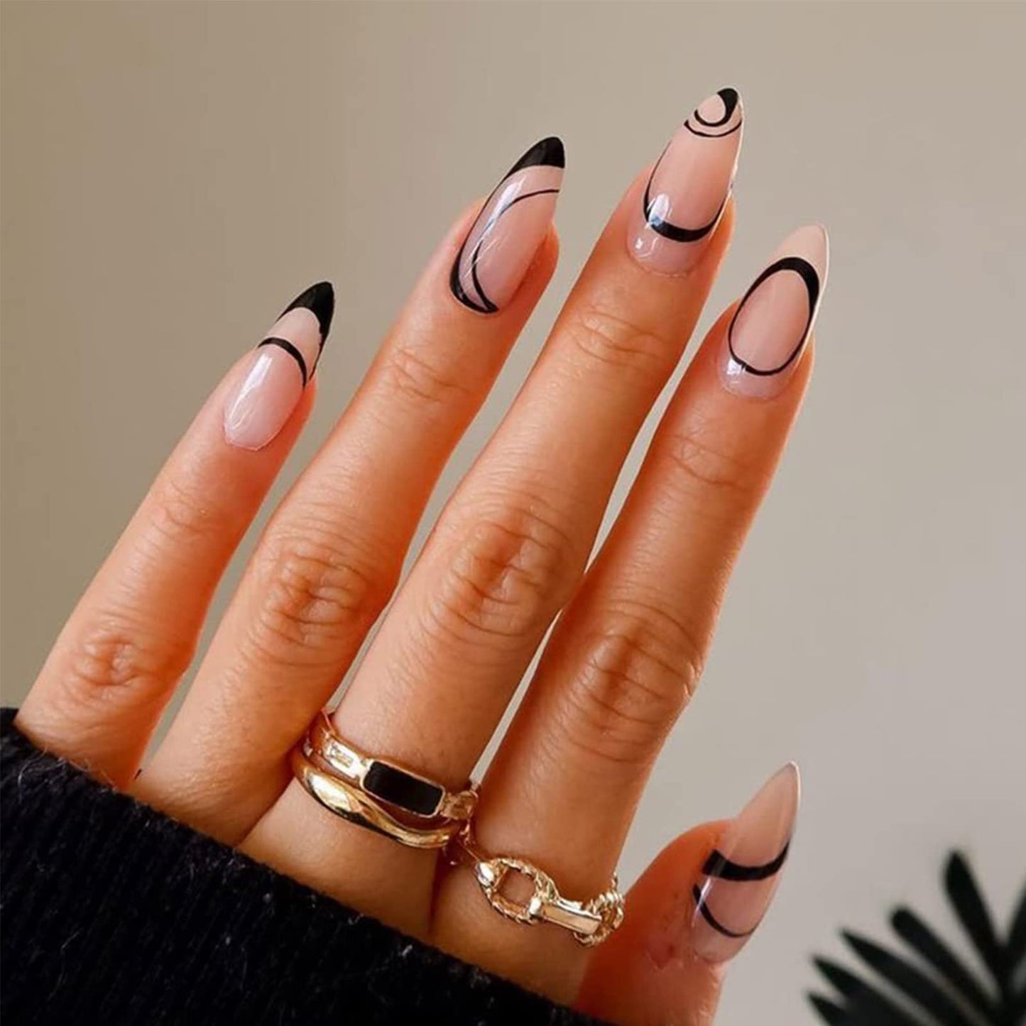 Full collection of 144 piece press on nails displayed on a surface