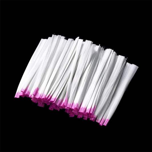Luzen fiberglass nail extensions laid out on a clean surface demonstrating the flexible six centimeter length