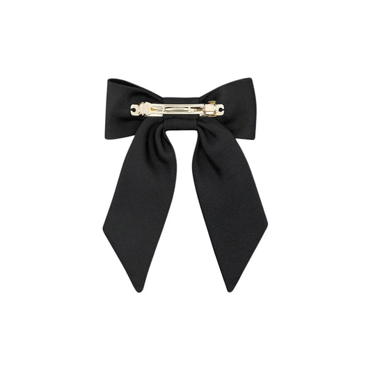 Oversized black ribbon barrette displaying the elegant long tail design styling