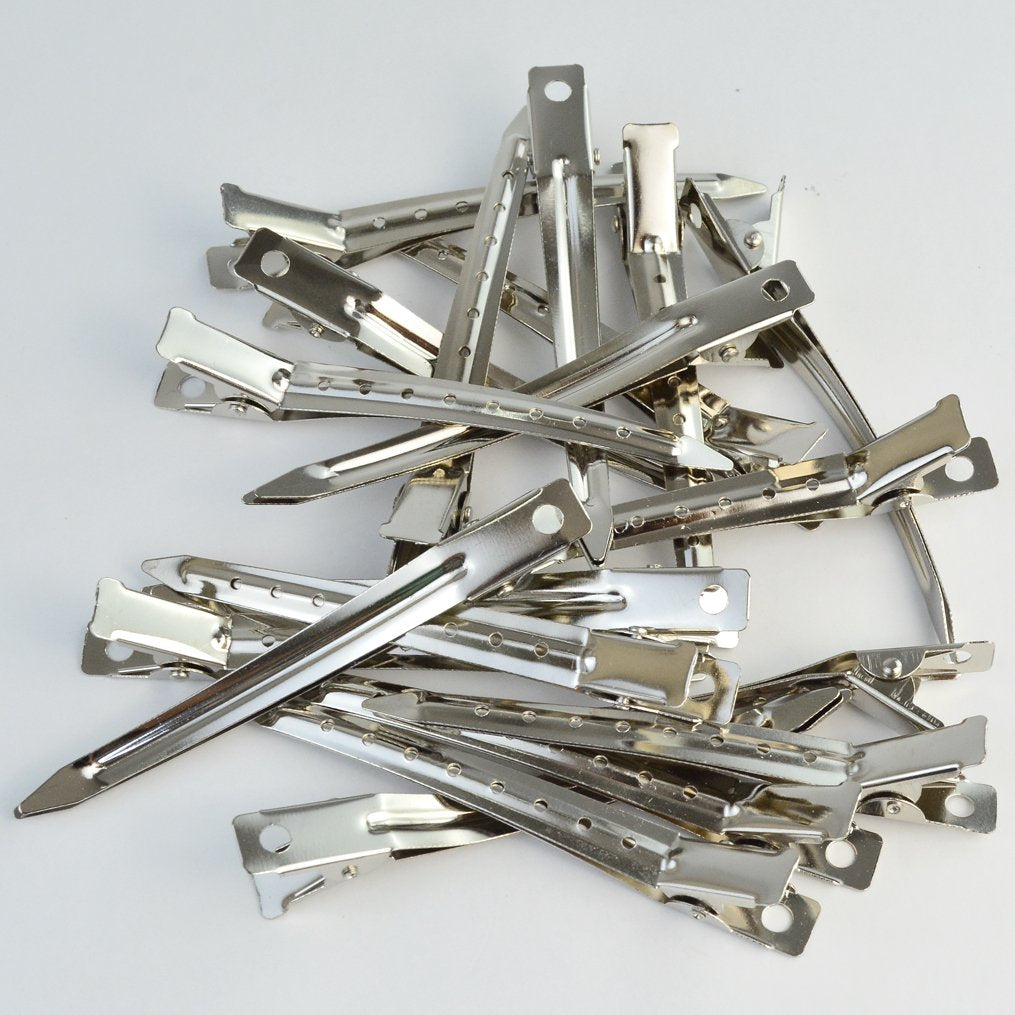 Side profile view showing the thin and sturdy design of the metal alligator clip