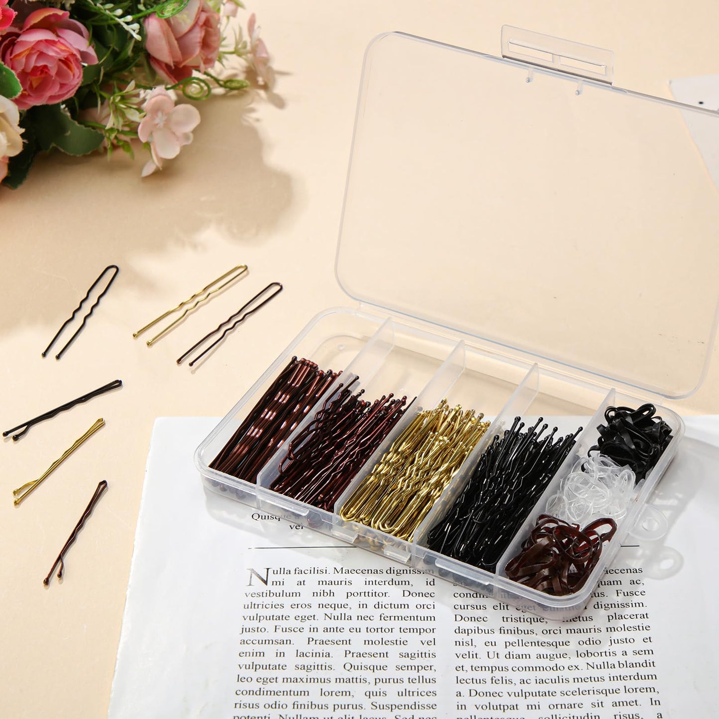Complete overview of the 480 piece professional hair pin kit featuring secure elastic ties and multiple pin variants.