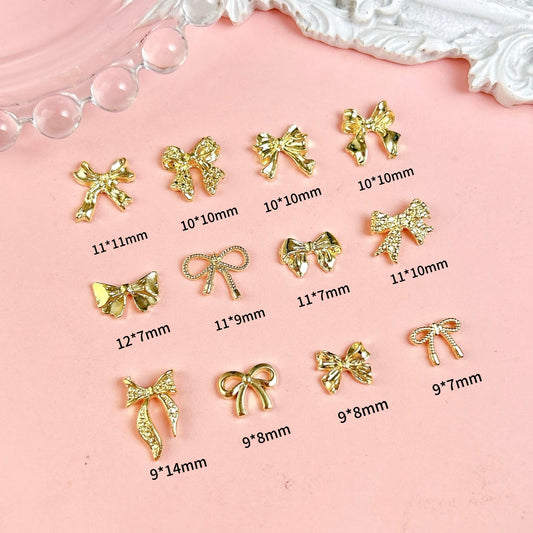 Close up of 3D metal alloy bowknot nail art decorations