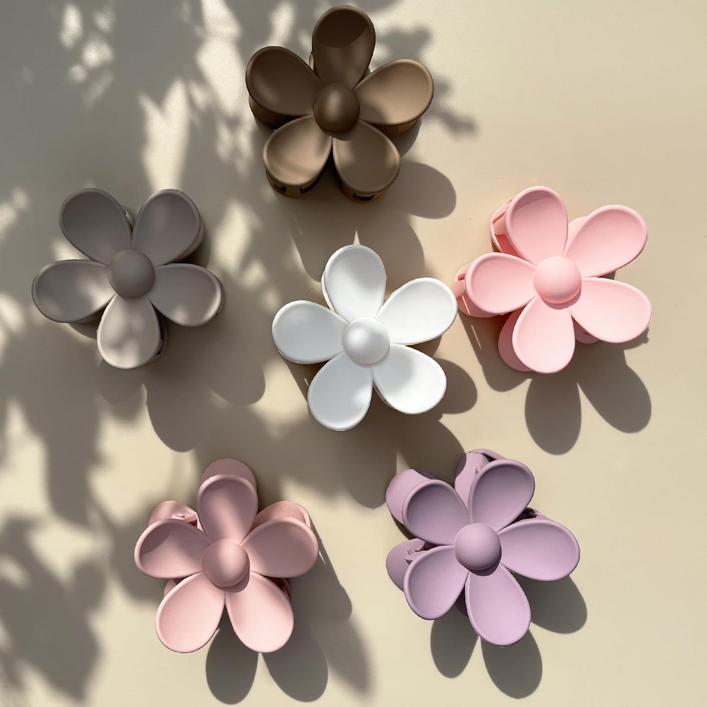 Full collection of Mehak S 6 piece pastel color daisy clips