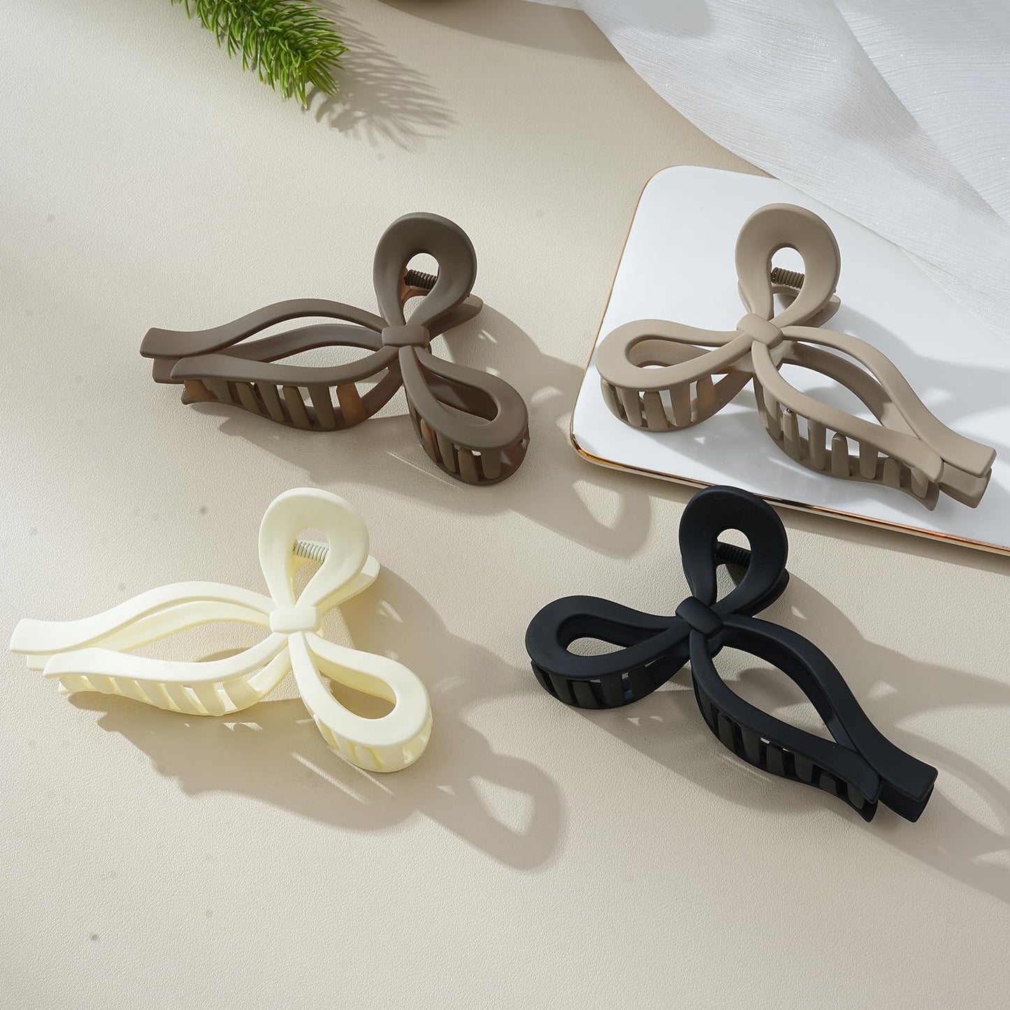 Professional model wearing an Eparty bow claw clip for elegant styling