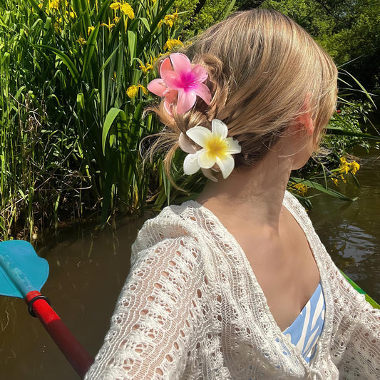 Close up of colorful floral hair claw clips for thick hair