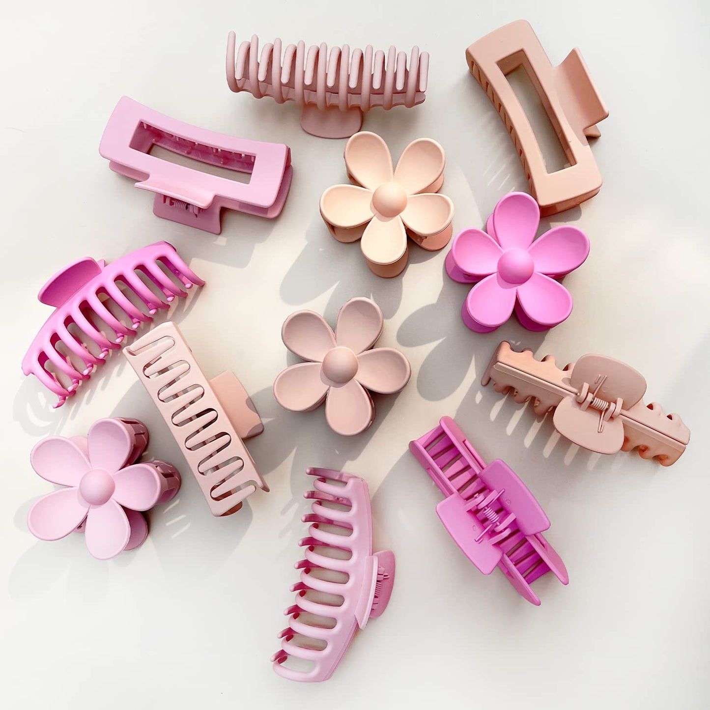 Woman wearing stylish matte pink hair claw clip for updo