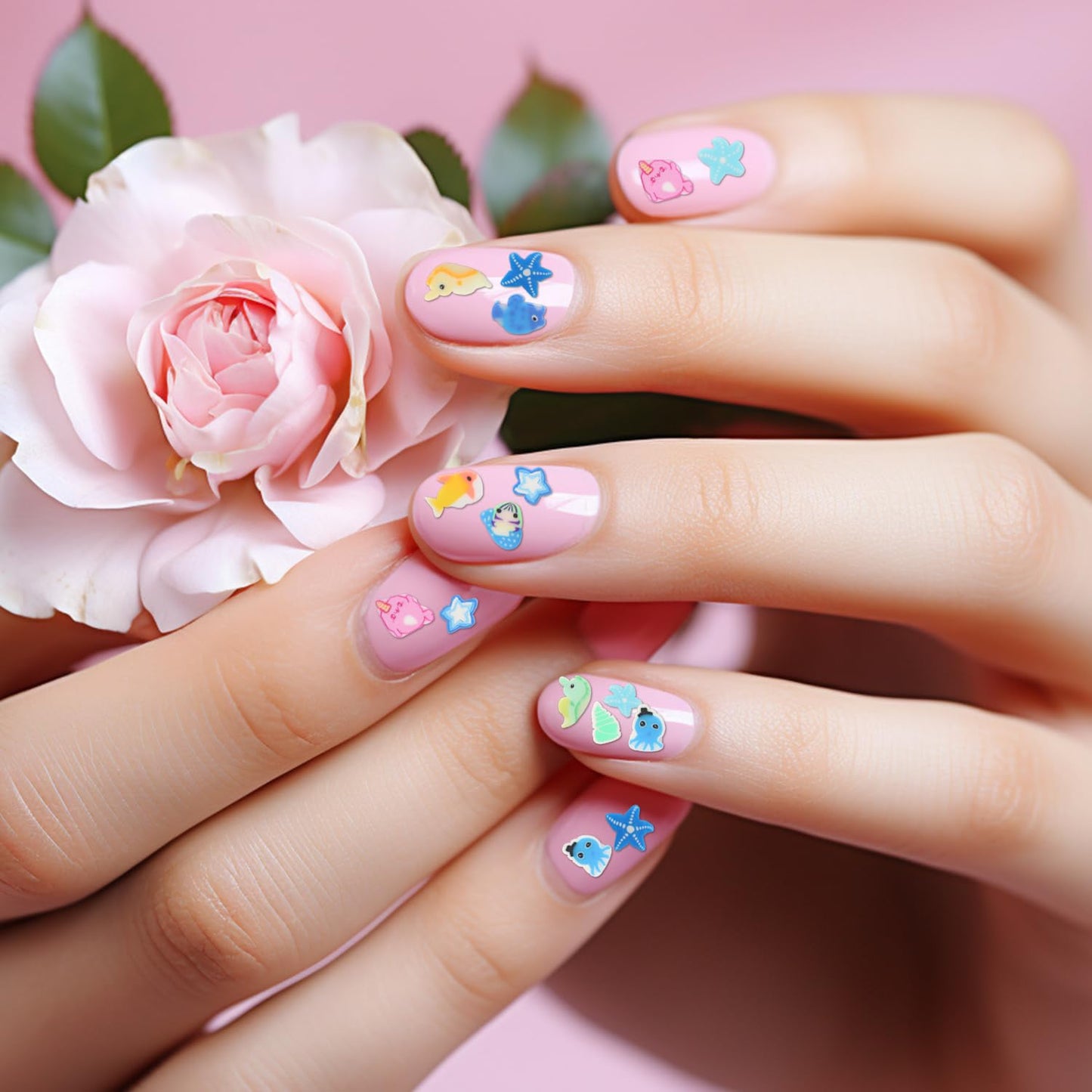 Arrangement of seashells and seahorse nail art slices