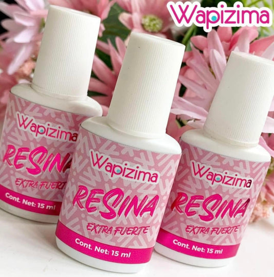 Close up of Wapizima professional extra strong nail adhesive packaging