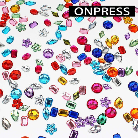 Close up of colorful 3D heart and star nail charms