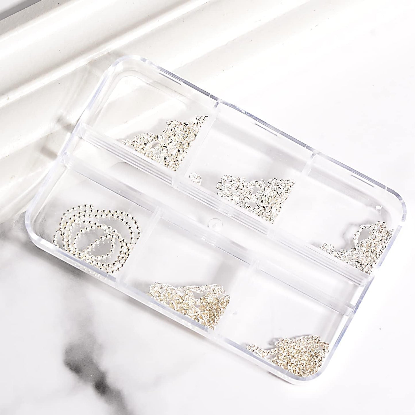 Complete package of Sindy Jerclity six strip silver alloy metal nail decorations for women