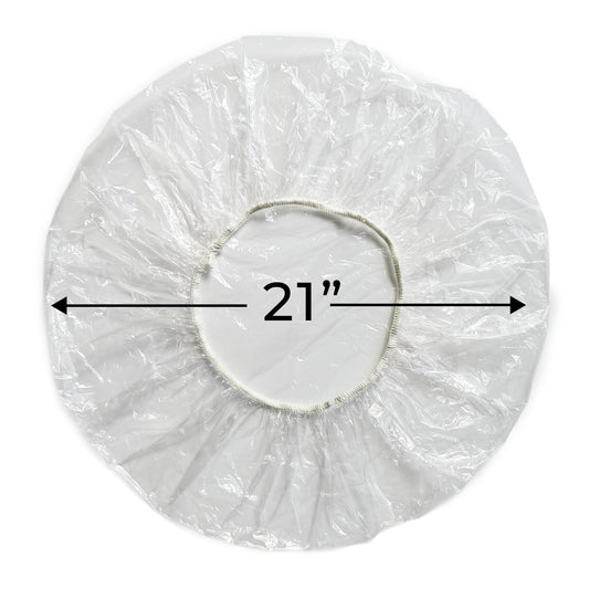 Clear plastic hair processing cap being used for deep conditioning treatment
