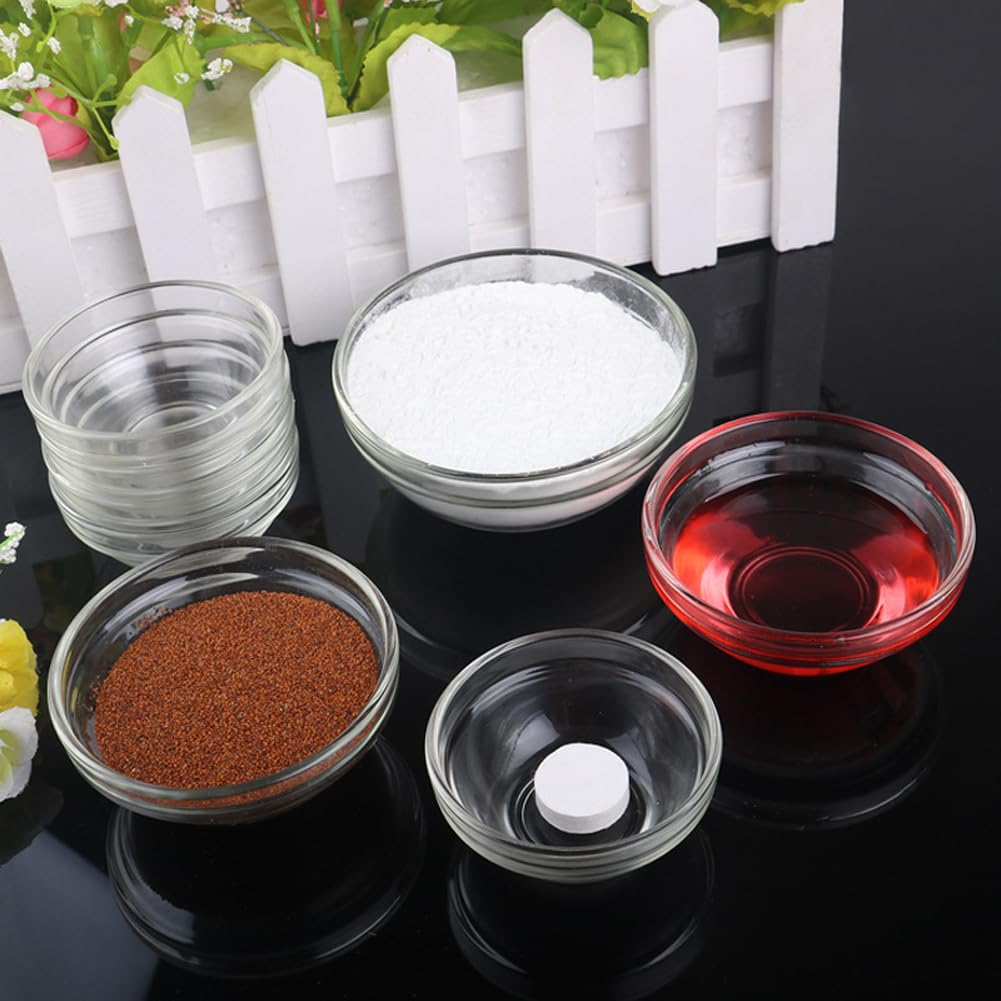 Three pieces of Luzen clear glass cosmetic beauty tools next to a mixing spatula for home facial care.