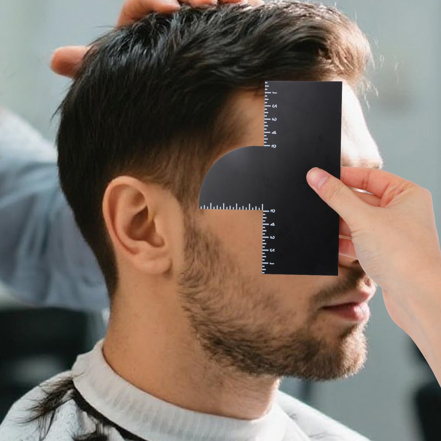 Flexible PVC edge hair line card bending slightly to demonstrate its contours.