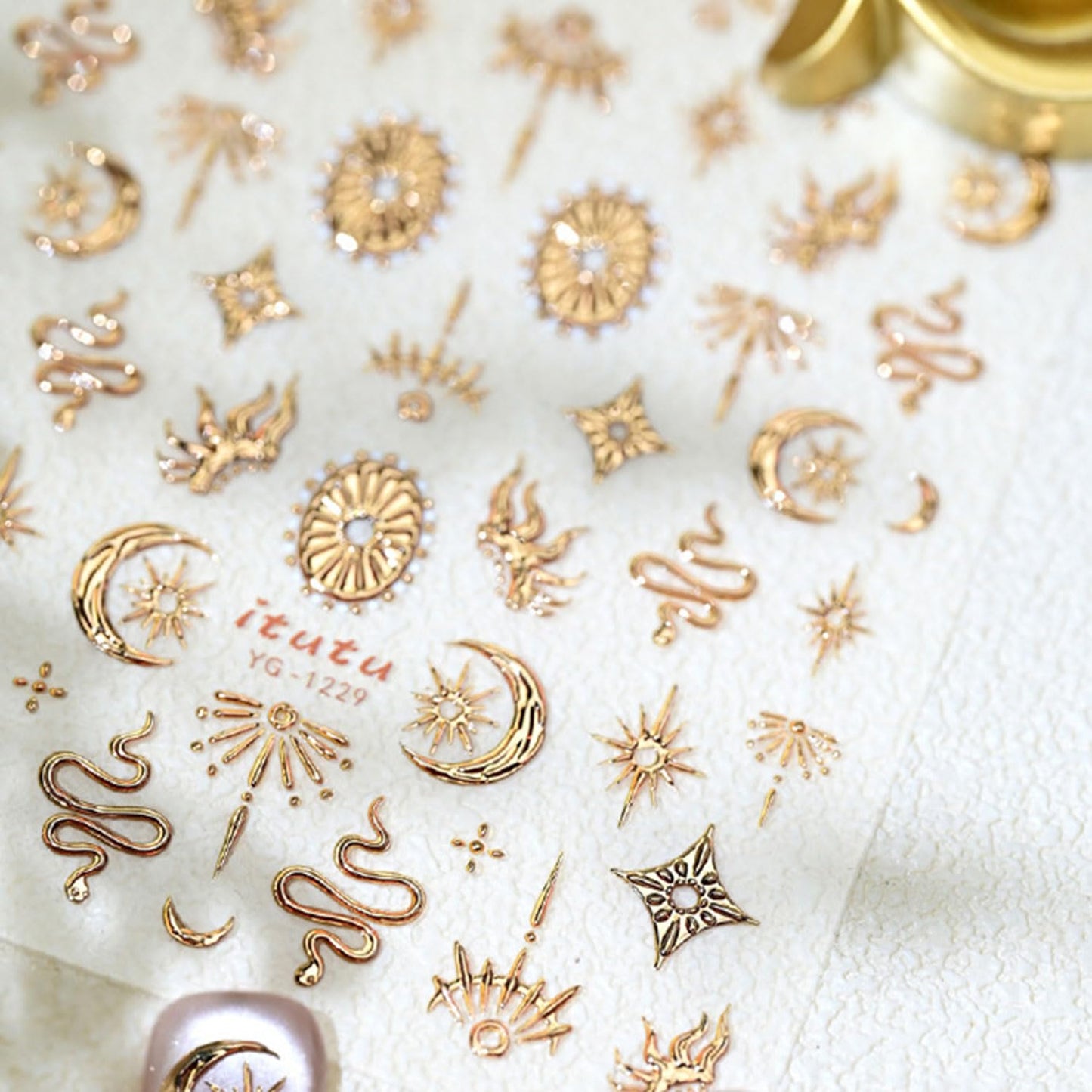 Assorted gold nail art stickers for women and girls