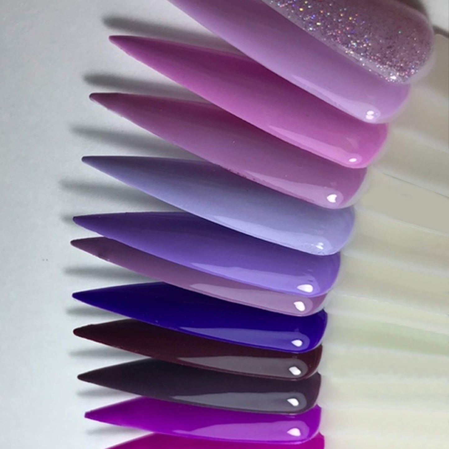 Three sets of nail polish display sticks for salon use