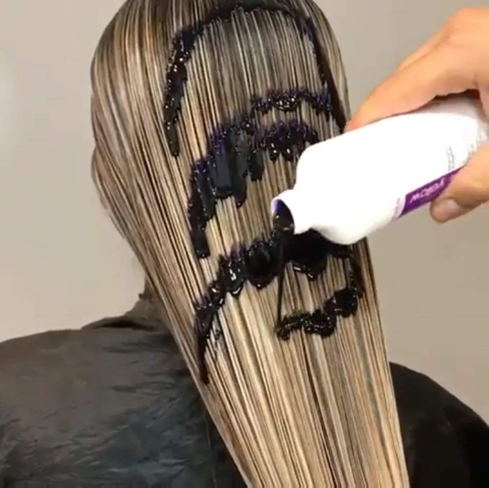 Fanola color correcting hair mask bundle placed on a clean background for product display.