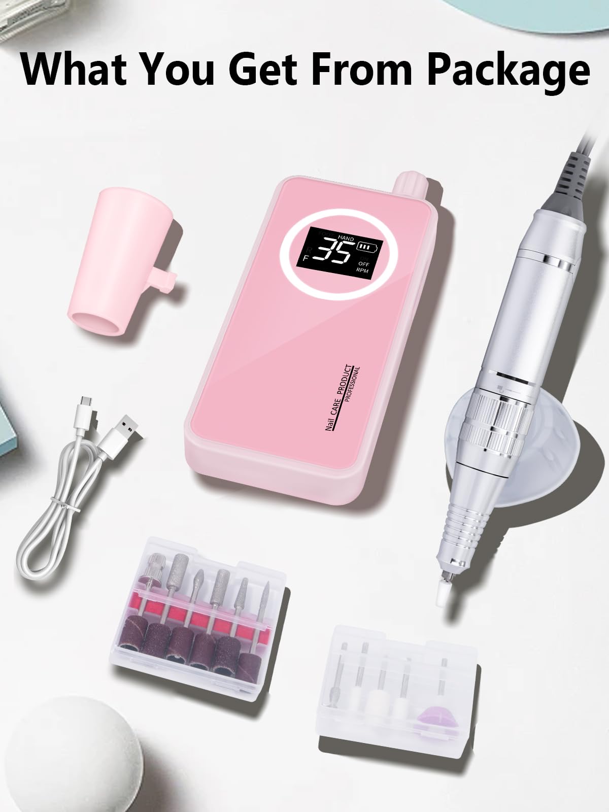 Complete nail drill set with bits and accessories in pink