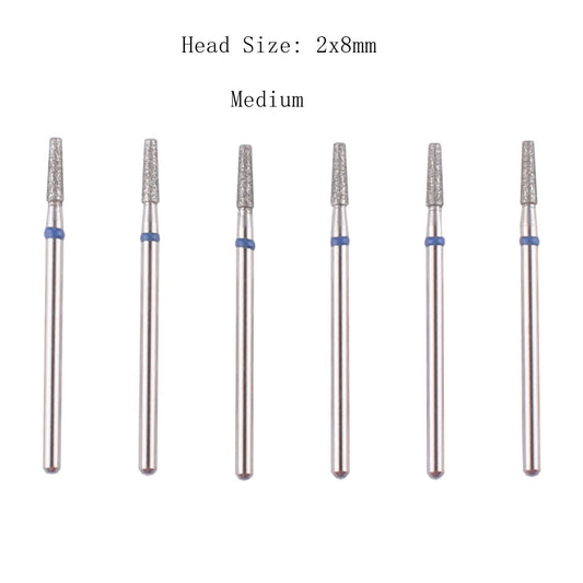 Close up of professional diamond nail drill bits showing fine and medium grits