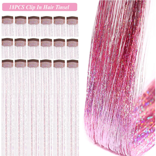 Close up of the damage free metal snap clip on pink fairy hair tinsel