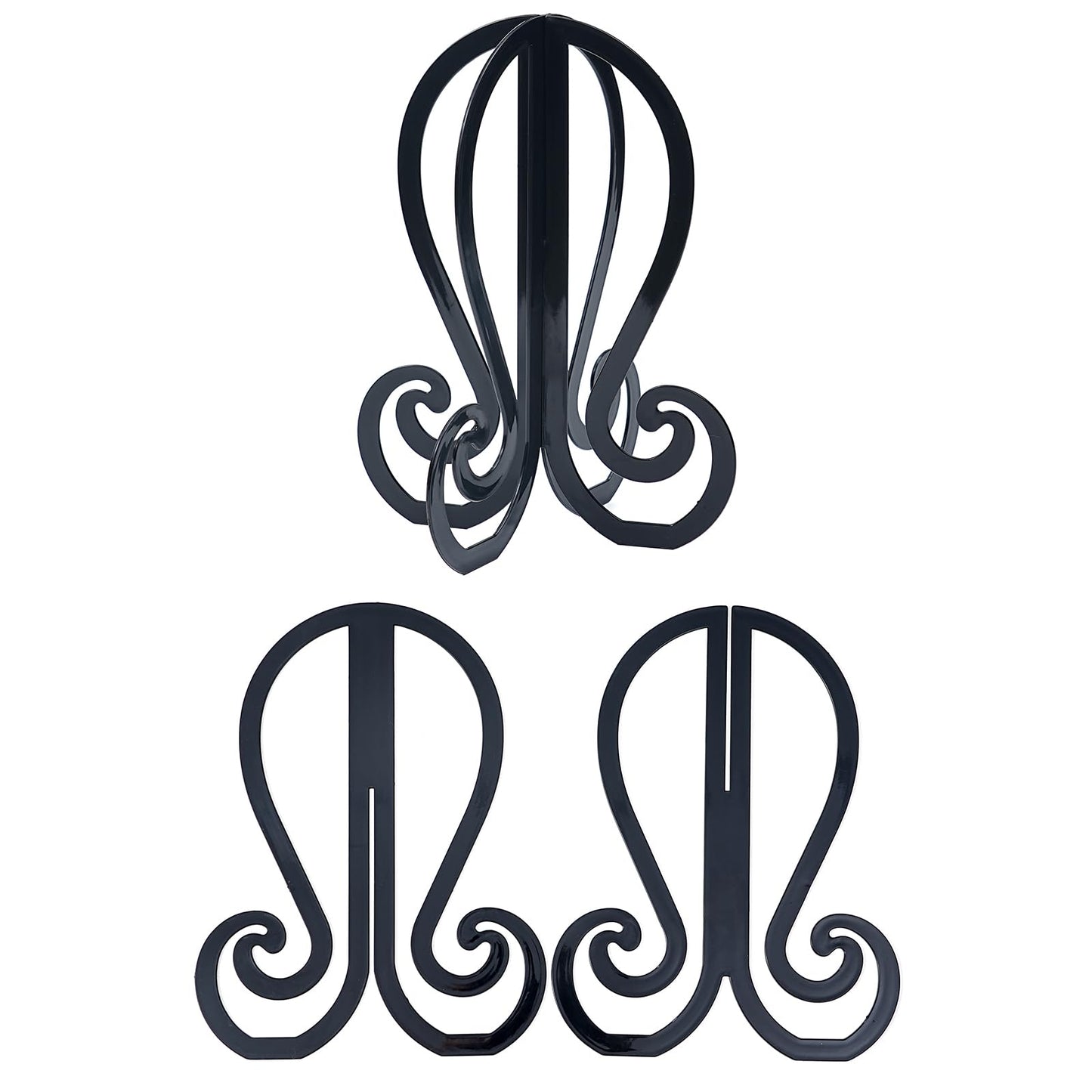 Three black wig stands displayed on a vanity for accessory organization