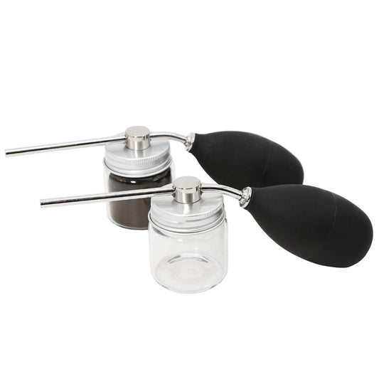 Close up of the 3rd Generation larger nozzle on the Finally Hair atomizer pump for precise hairline styling.