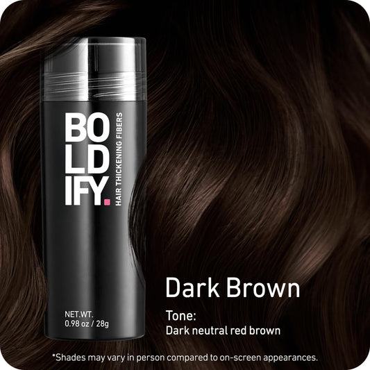 Authentic Boldify hair building powder being applied to a thinning crown for instant volume.