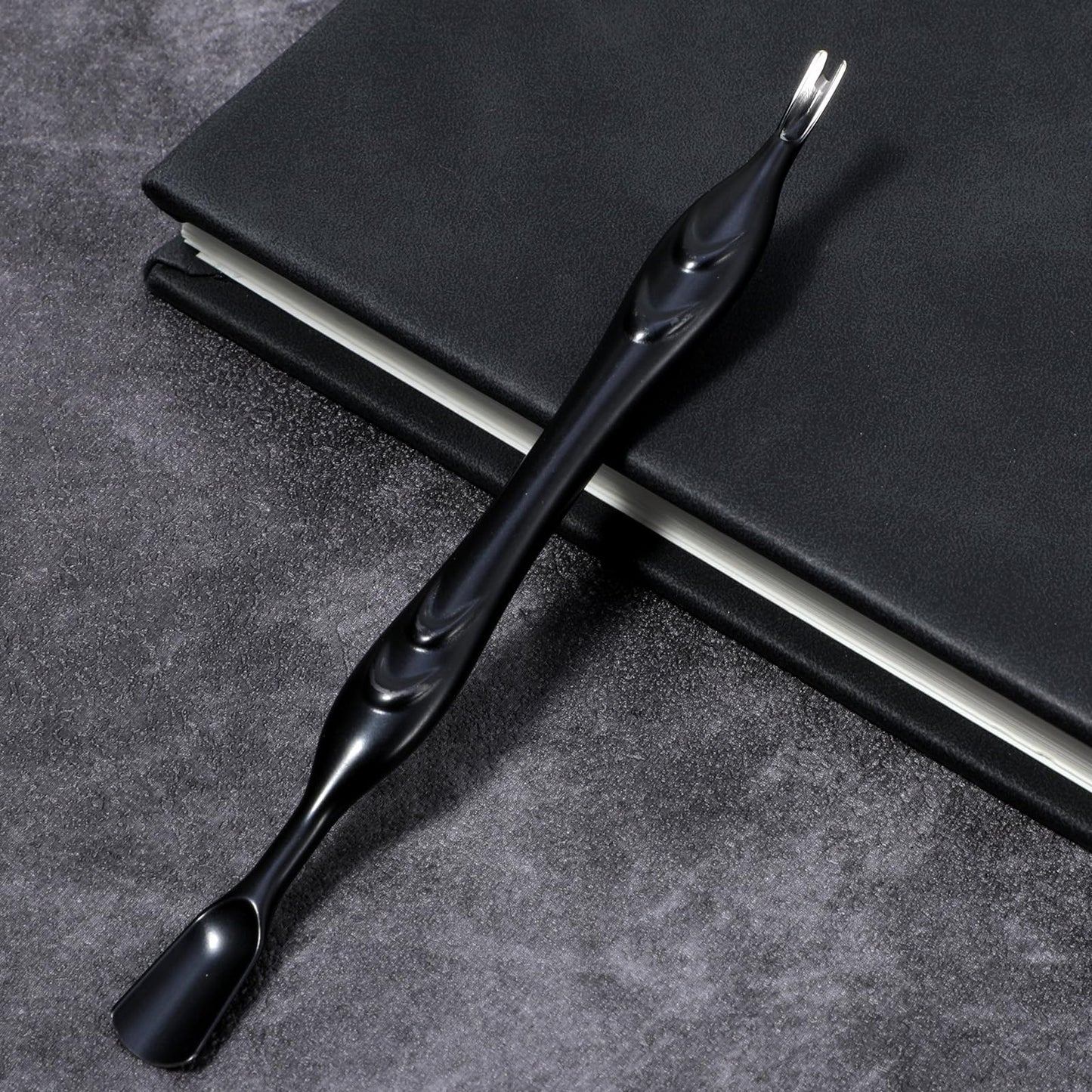 Lifestyle shot of cuticle pusher and trimmer for salon use