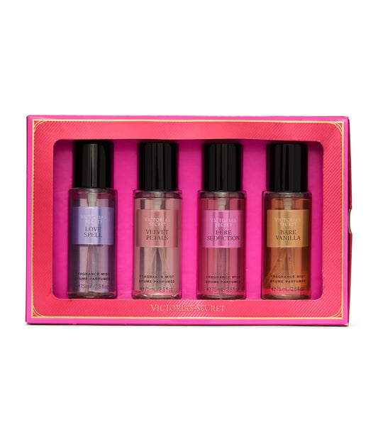 Victoria's Secret travel size body spray set showcasing four mini bottles sorted side by side