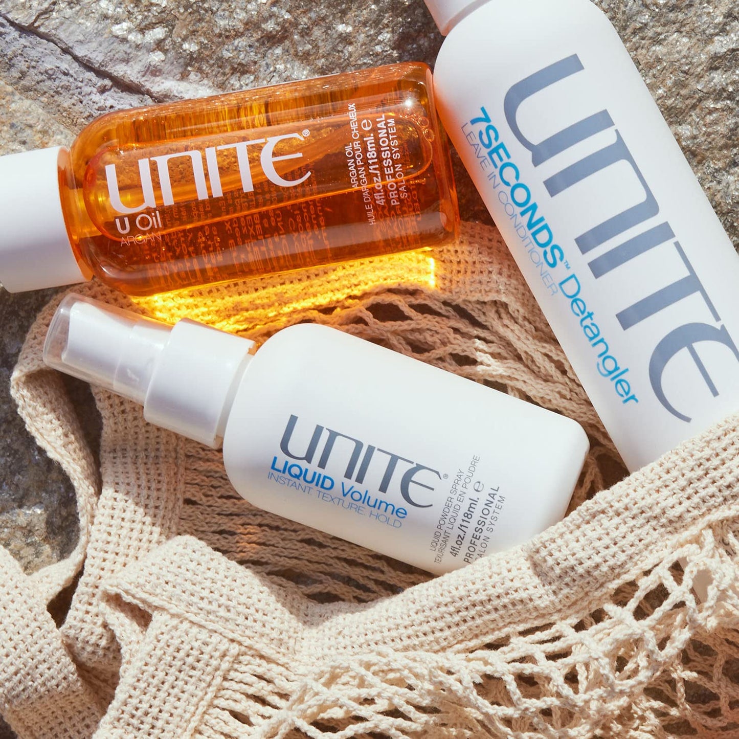 Authentic USA imported UNITE Hair LIQUID Volume spray bottle back view with ingredients list