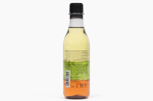 Natura Ekos Andiroba 200 Milliliters body oil showing distinct triple phases