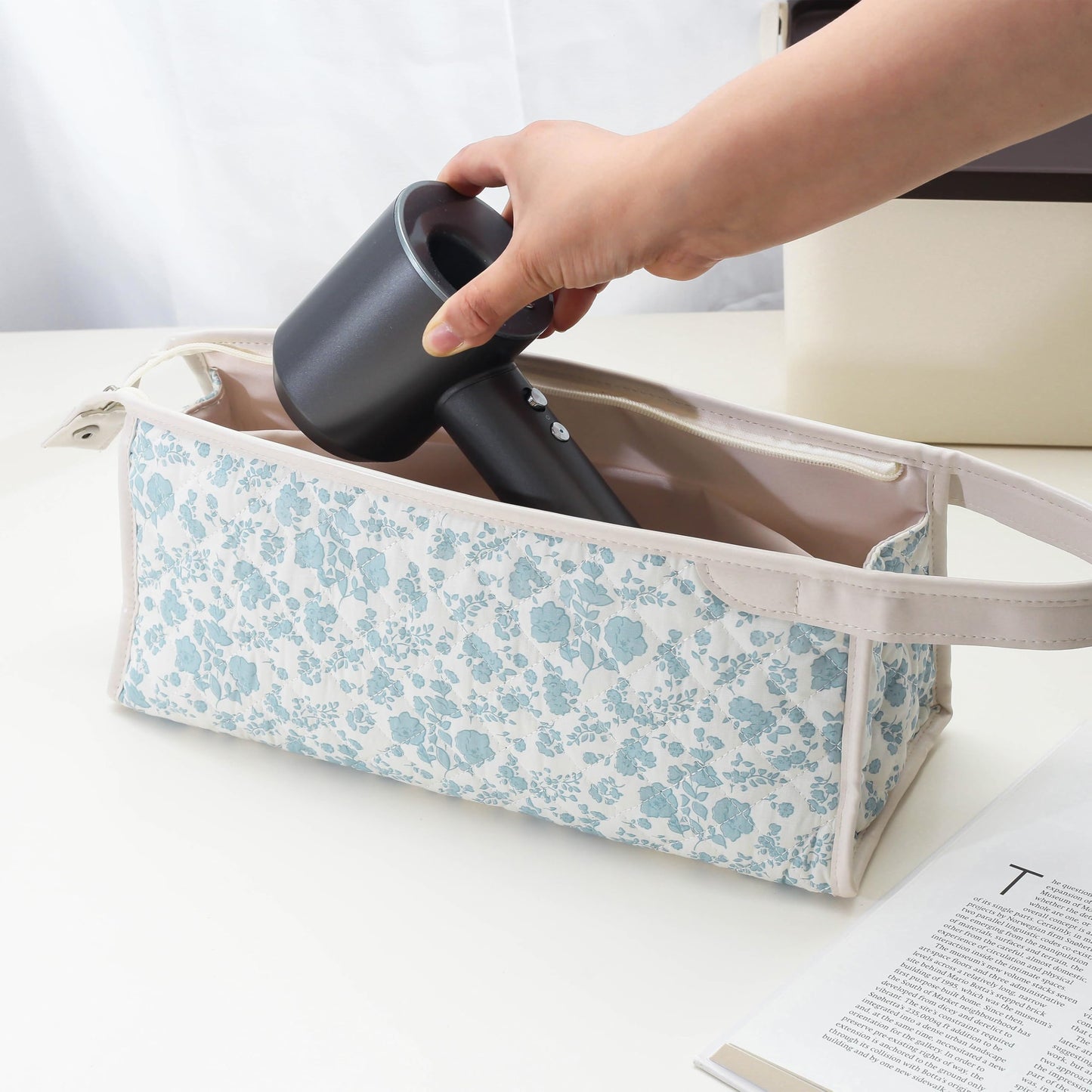 GISMTR travel organizer packed inside a large suitcase alongside holiday essentials