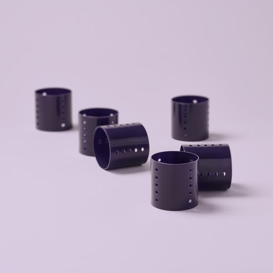 Close up of Diane jumbo purple hair rollers highlighting the ventilated airflow holes.