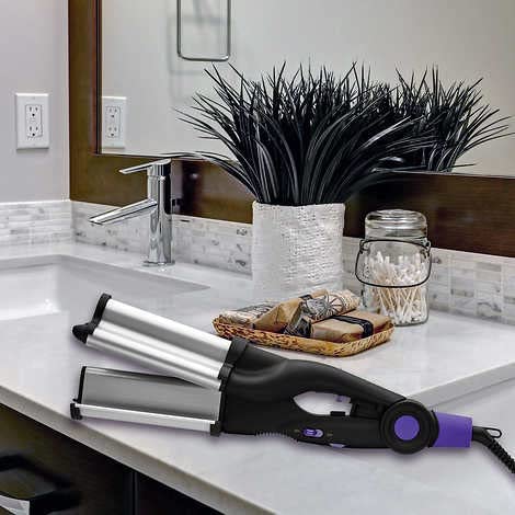 Hot Tools professional hair waver showing the universal dual voltage plug and long power cord.