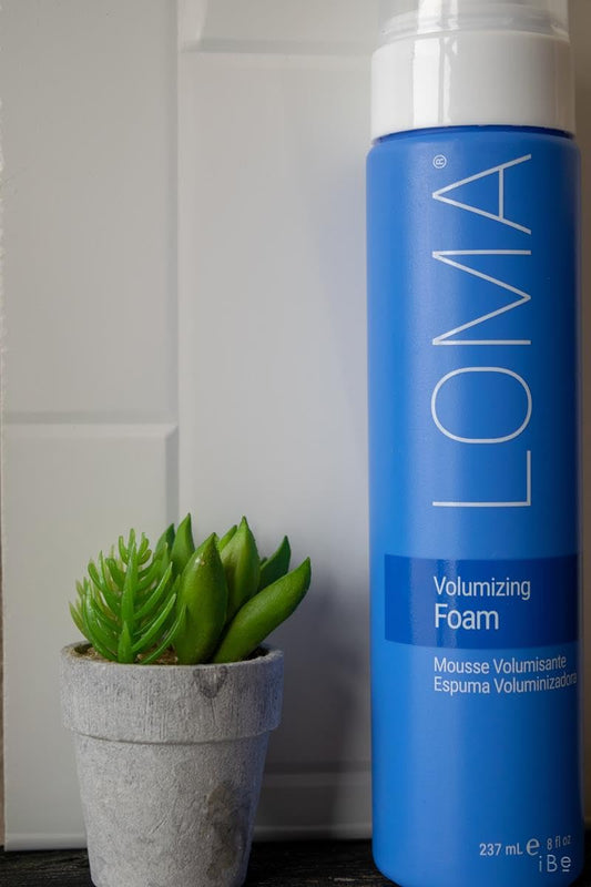 Loma professional styling mousse bottle showcasing clean beauty texturing formula