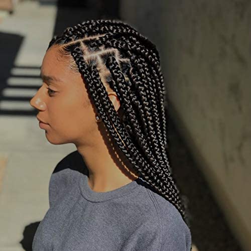 Close-up of Pure O Natural Neatbraid hair styling gel showing text details on alcohol-free and non-flaking benefits.