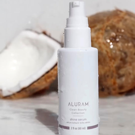 Aluram high shine glossing treatment bottle showing clean beauty product labeling