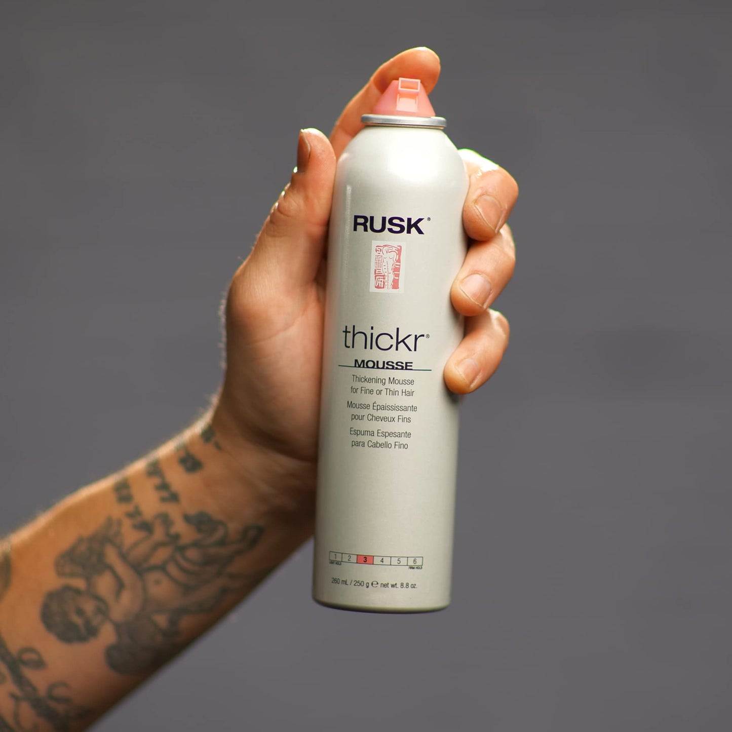 Authentic Rusk Thickr hair thickening mousse aerosol container for humidity control styling