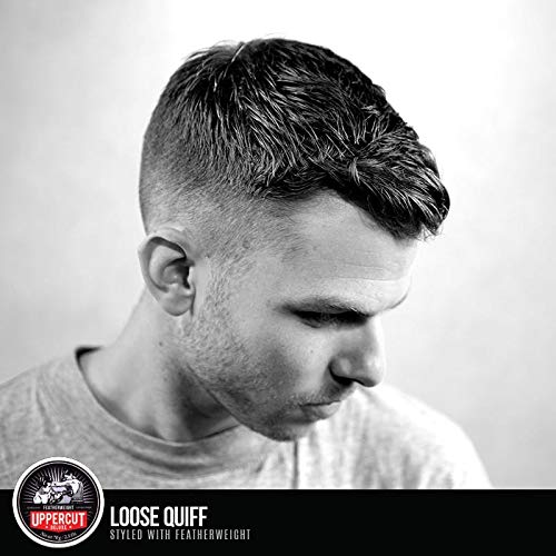 Close up of Uppercut Deluxe Featherweight hair pomade showing premium product details