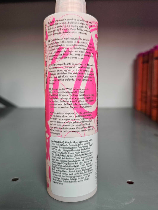 Amika Reset scalp treatment application on hair roots