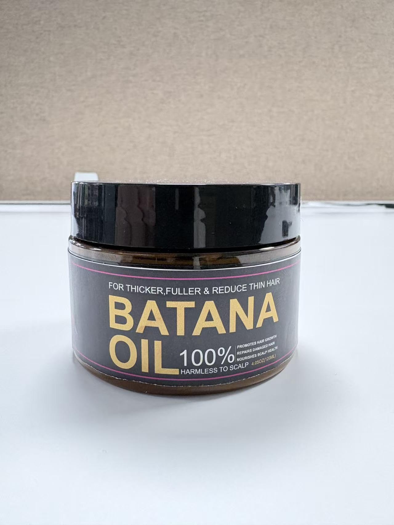 Qytin Batana oil for hair growth lifestyle shot