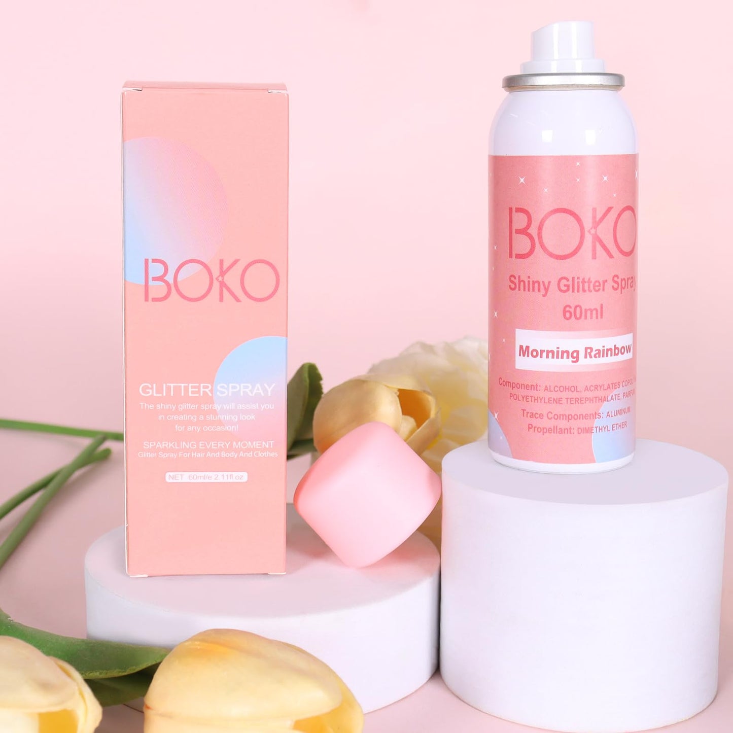 Boko shiny hairspray and body highlighter shimmer bottle on clean background.