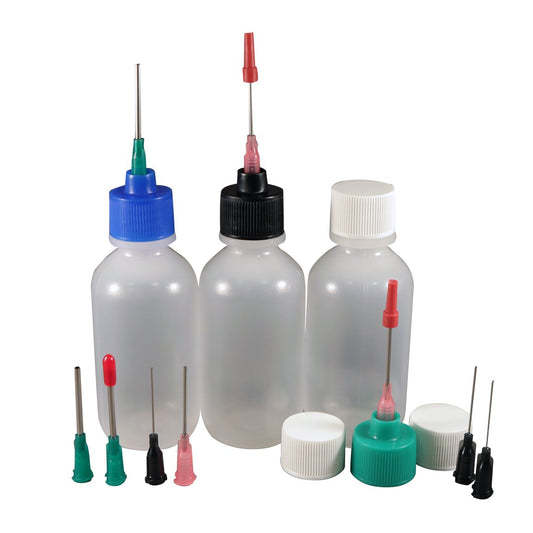 Close up of the non medical blunt dispensing needles and Luer Lock caps included in the Jensen Global kit.
