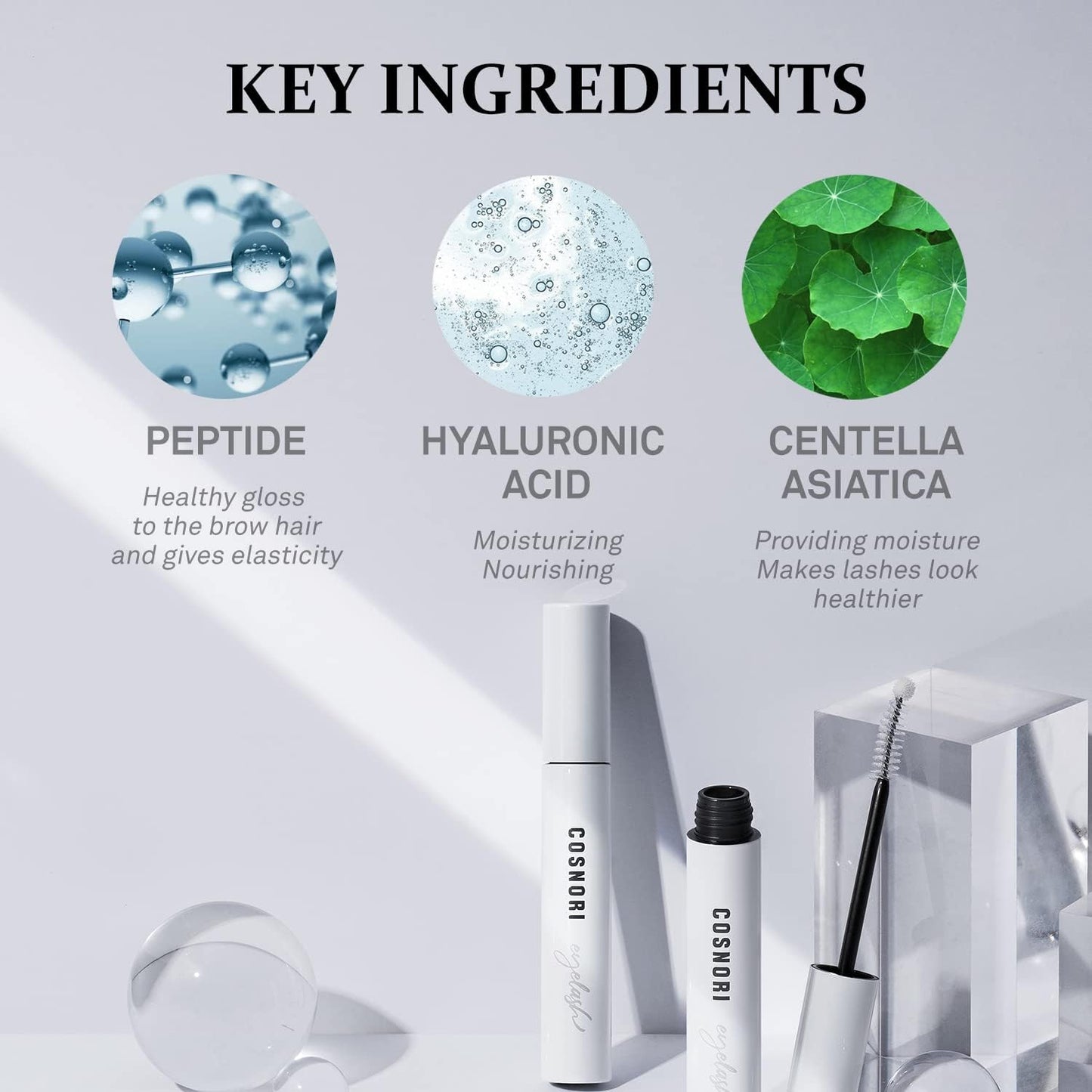 Cosnori long active lash serum unboxed beside its clean white minimalist retail packaging.