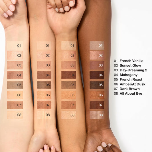 Open Clinique eyeshadow palette showing 8 shades and mirror