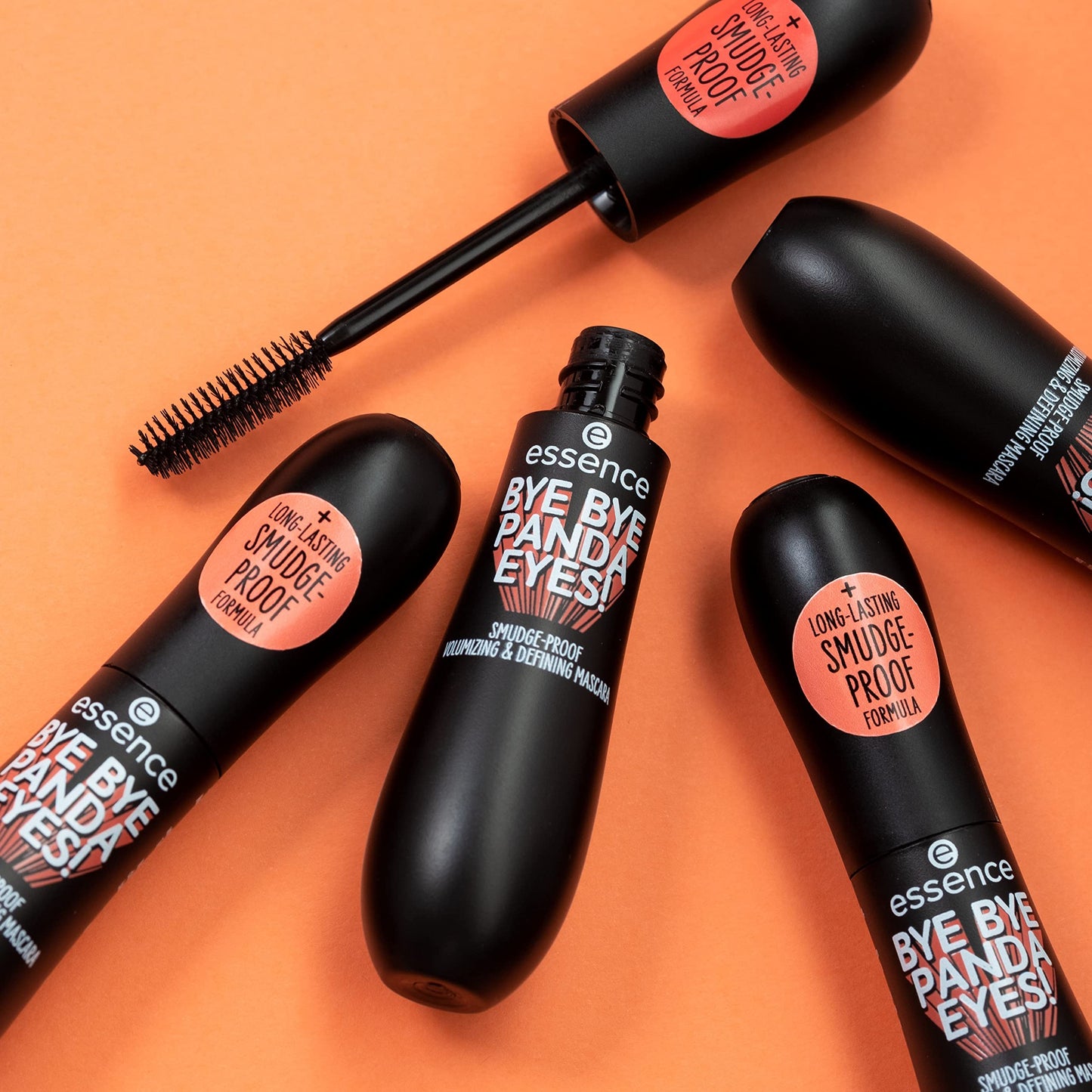 Essence 01 Black mascara open tube revealing the volumizing brush head.