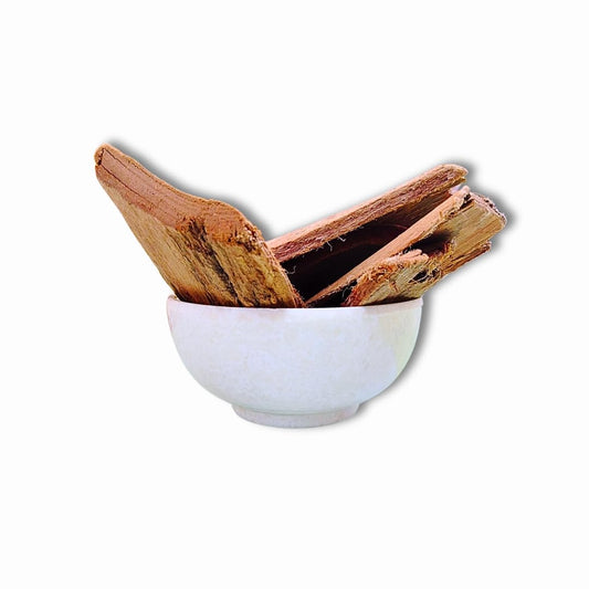 My God Gift raw Ashoka bark natural Ayurvedic supplement pieces displayed on a flat surface.