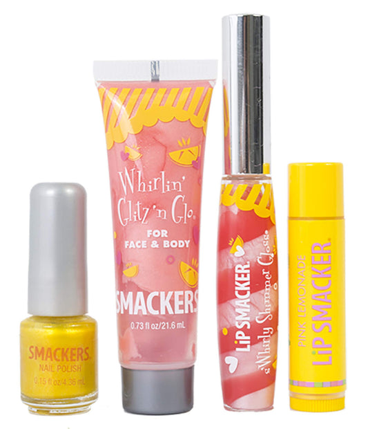 Lip Smacker girls makeup kit components including moisturizing lip balm, shimmer gloss, nail polish, and lotion.