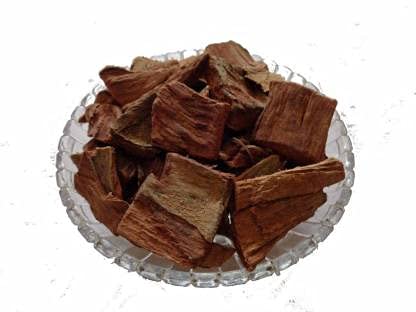 Authentic natural sun dried Arjun tree bark chunks from Will And Weaves showing raw product quality.
